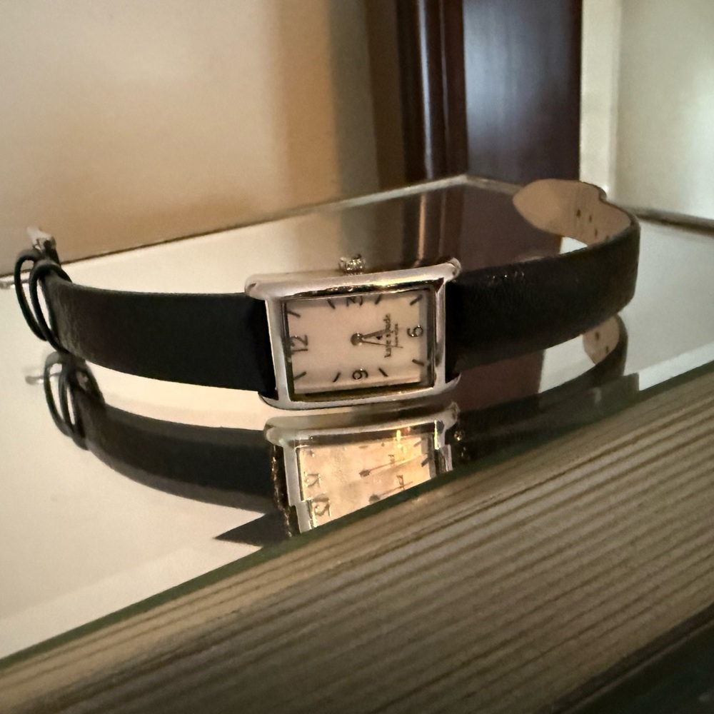 Kate Spade Black w/Silver Hardware
Needs a battery 
Good Condition